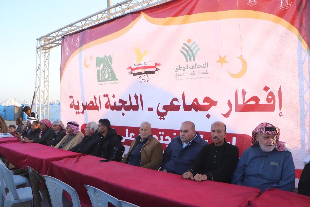 Organization of the largest collective iftar banquet inside the Egyptian camp 18
